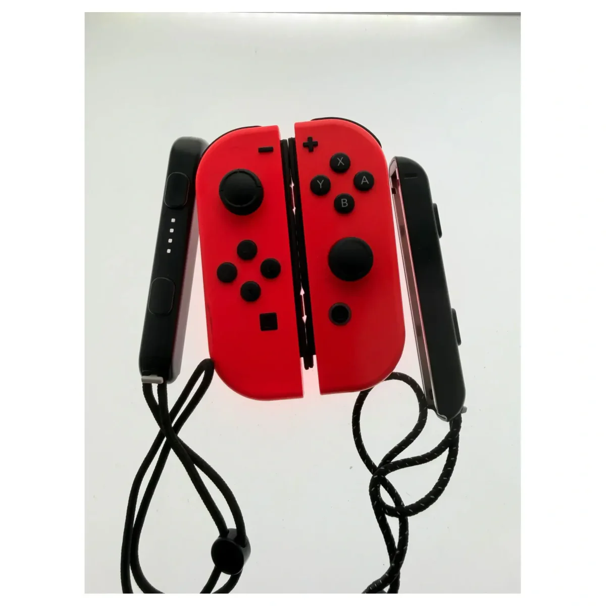 Joy-Con set — Neon Rojo (con correas de muñeca) (Nintendo Switch) — parte trasera