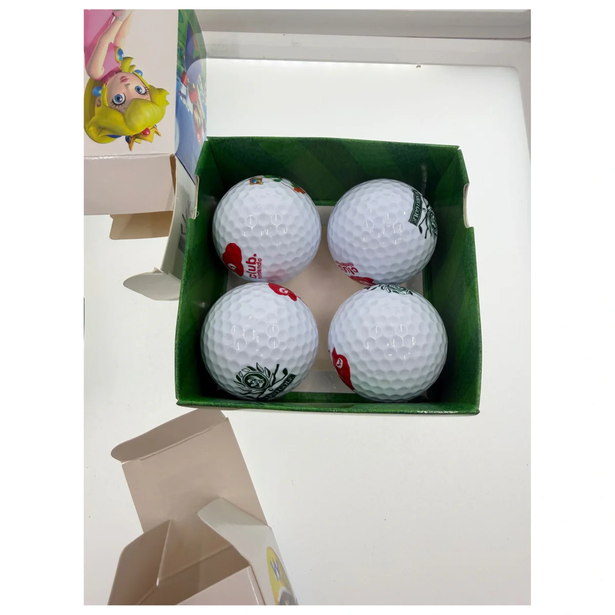 Mario Golf: World Tour Golfballen — Club Nintendo (set van 4, в кутия) (Nintendo 3DS) — детайлна снимка 1