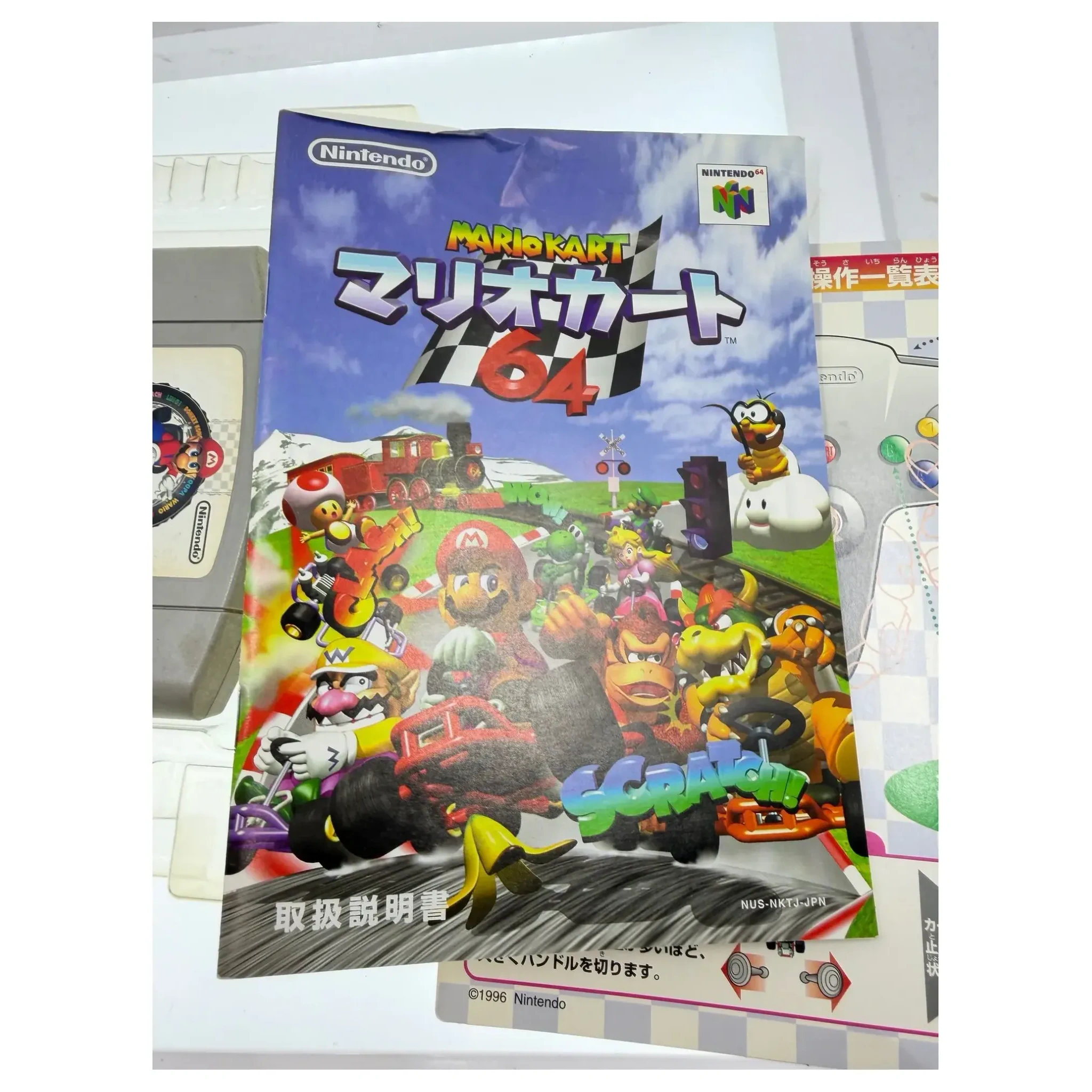 Mario Kart 64 (JPN) Nintendo 64 Detail — Game in doos met handleiding
