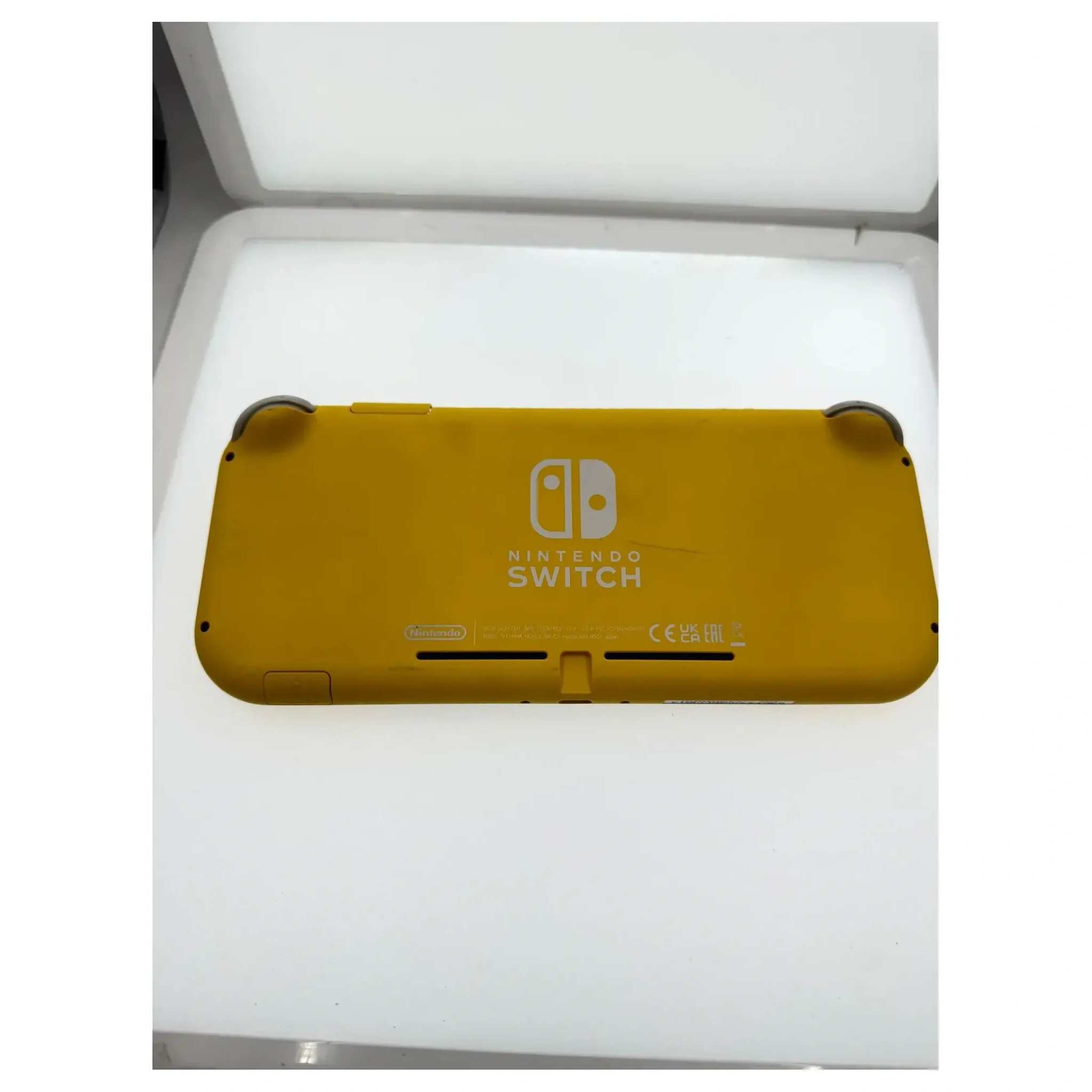 Nintendo Switch Lite Geel Nintendo Switch Achterkant — Losse console